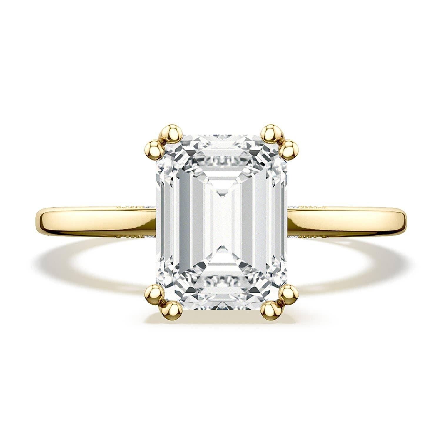 emerald-solitaire-engagement-ring-268215ec