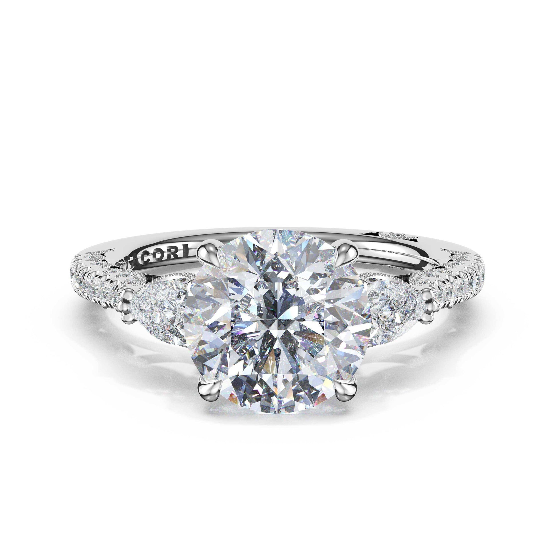 3-stone-pear-diamond-side-round-engagement-ring-477RD